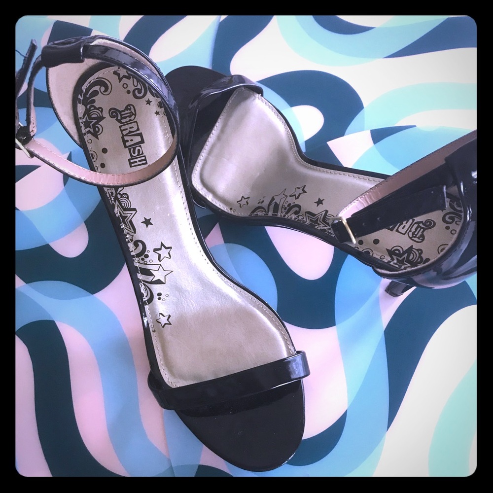 Black Sexy ankle strap high heals.